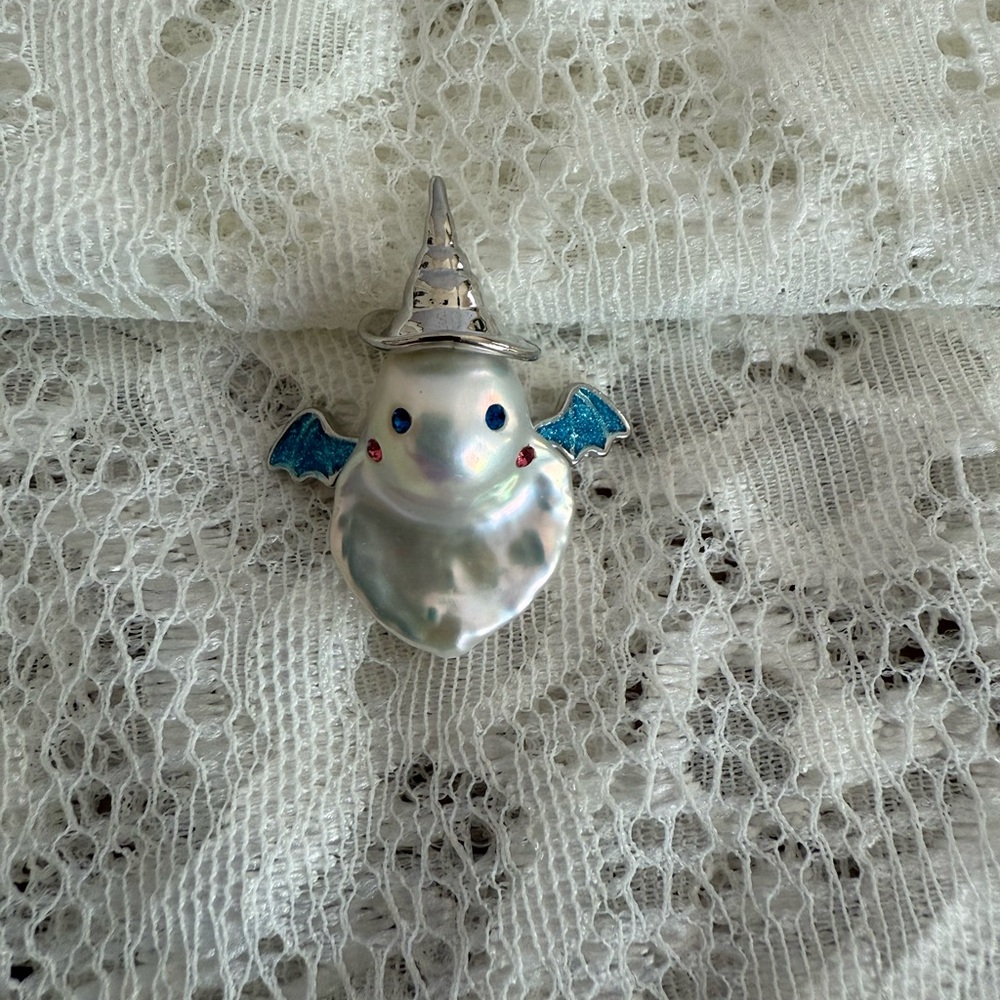 Silver Ghost Pendant with Blue Accents brand new but no price tag.